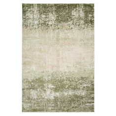 an area rug with green and beige tones