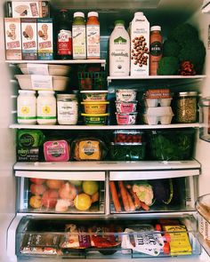 an open refrigerator filled with lots of food