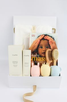 the baby massage gift box includes an assortment of body care products and personal care items