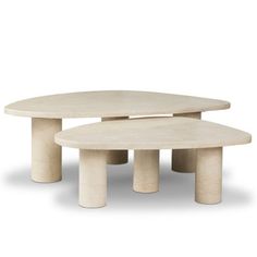 two tables sitting on top of each other in front of a white background and one is made out of plywood