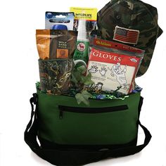 a bag filled with food and snacks sitting on top of a wooden table next to a tree