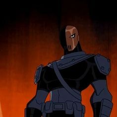 the animated character is standing in front of an orange and black background with his hands on his hips