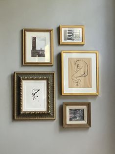 several framed photographs hang on the wall