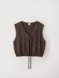 Composition : Wool 100%Color : BrownCountry of Origin : KOREA Brown Chunky Knit Top, Brown Knitted Sweater Vest For Winter, Brown Cable Knit V-neck Outerwear, Brown Wool Sweater For Spring, Spring Brown Wool Sweater, Cozy Brown Knit Sweater Vest, Fall Knitted Brown Sweater Vest, Brown Wool Textured Knit Cardigan, Brown Wool Textured Knit Outerwear