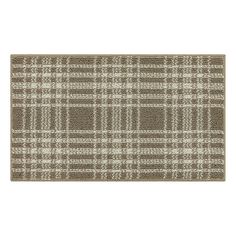 a brown and white plaid rug on a white background