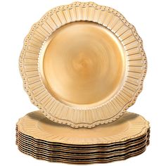 a stack of gold plates sitting on top of each other