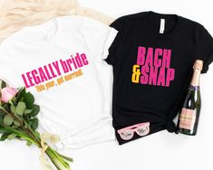 two t - shirts with the words legally bride and each other next to a bottle of champagne