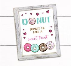 a sign that says donut forget to take a sweet treat with doughnuts