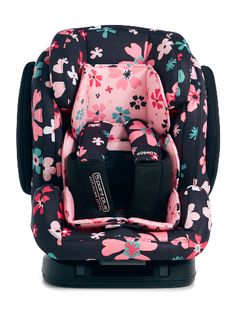 the child's car seat has pink flowers on it and is attached to a black base