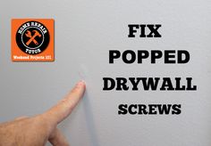 a hand pointing at a wall with the words fix popped drywall screws