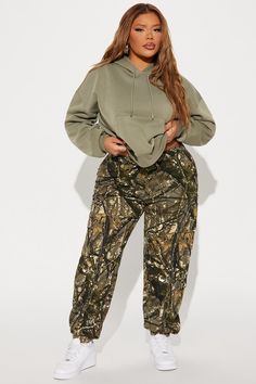 Available In Olive/combo And Grey/combo. Jogger Pant Low Rise Button & Zip Closure Cargo Pockets Zipper Detail Camo Print Non Stretch Disclaimer: Due To The Specialized Wash And Printing Process, Each Garment Is Unique. 98% Cotton 2% Other Fibers Imported | Had You Fooled Camo Jogger Pant in Olive Green size 2X by Fashion Nova Camo Sweatpants, Camo Jogger Pants, Camouflage Outfits, Printed Jogger Pants, Camo Joggers, Flare Pant, Sweater Jumpsuit, Printed Joggers, Drawstring Hoodie