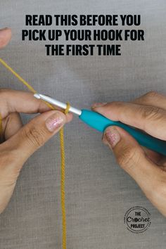 two hands are knitting yarn with the words read this before you pick up your hook for the first time