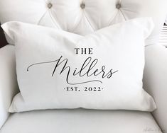 a white couch with a pillow that says the millers