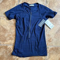 New With Tags. Navy. Size Small. Blue T-shirt For Gym, Functional Blue Crew Neck Top, Functional Navy Sports Top, Navy Moisture-wicking Sportswear Top, Functional Navy Tops For Sports, Navy Functional Stretch Tops, Navy Short Sleeve Tops For Athleisure, Navy Fitted Sportswear Tops, Navy Athleisure Tops For Sports