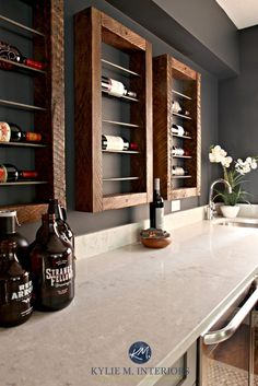 the kitchen counter is clean and ready to be used as a wine rack for bottles