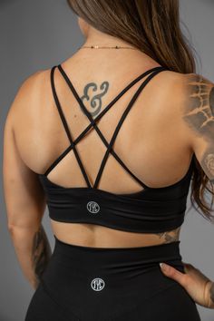 A playful and cheeky sports bra to flaunt your back gains, featuring a daring low-cut front for a sporty yet feminine appearance! This item is a popular choice for its one-of-a-kind, sassy design, along with its ultra-soft and cozy fit. Model is wearing size small, with a bust measurement of 32 B. Back Gains, Tall Leggings, Long Sleeve Tank Top, White Sports Bra, Cozy Fits, Feminine Look, Sports Leggings, Your Back, Tops For Leggings