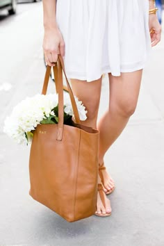 Kat's tote story... summer whites and hydrangeas! #MyToteStory Carrying Flowers, Brand Handbags, Buckled Flats, Monogram Tote, Twitter Account, Monogrammed Leather, Up Girl, Fashion Outlet