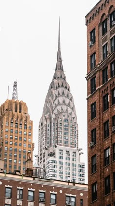 the chrysler building towering over other buildings in new york city