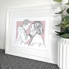 a black and white drawing of a man kissing a woman's forehead in front of a potted plant