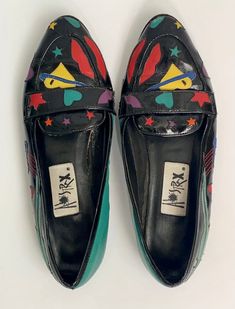 Absolutely hip and fun vintage slip on shoes by designer Asterix! Perfect for any lover of 80s fashion! Multi patterned vibrant designs of lips, stars and hearts! Such unique and trendy loafers for your next day out. These fabulous loafer shoes were made in Brazil Great vintage condition Size 8.5 US SHIPPING  FREE International shipping, please see the rate Please add our shop as a ❤ favorite so you can find us again! Our website is minxandonyx.com Www.facebook.com/minxandonyx @minxandonyx follow us on Instagram Thank you for shopping at Minx and Onyx Vintage! 80s Vintage Clothes, Vintage Flat Loafers For Spring, Vintage Flat Loafers, Vintage Flat Loafers With Rubber Sole, 80s Shoes Women, Trendy Loafers, Artsy Shoes, 80s Shoes, Navy Blue Purse