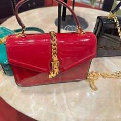 Height 6 Inches Width 8 Inches Depth 2.5 Inches New Never Used Interior Leather Neutral Hardware Gold Exterior Red Patent Leather Top Handle Mini Picture At Gucci Store Where I Bought It Gucci Serial Number Bag Looks Different In The Light It’s A Bright Deep Red Wonderful For Holidays Gold Gucci Party Bag, Gucci Top Handle Party Bag, Gucci Top Handle Bag For Party, Gucci Party Bags, Red Gucci Bag With Chain Strap, Gucci Red Evening Bag, Red Gucci Evening Bag, Trendy Gucci Evening Bags, Gucci Wallet On Chain