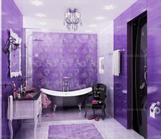 the bathroom is decorated in purple and white with a chandelier hanging from the ceiling