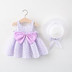 Dress your little one in this Princess Dress Set! Featuring a sweet and soft sleeveless dress with a cute oversized bow, flowers and a sweet sunhat to match! Made with cotton & polyester, it's perfect for a fun day at the beach or a special summer outing. Sooo…cute! Cute Baby Clothes Girl, Girls Beach Dress, Girls Tutu Dresses, Summer Baby Clothes, Sleeveless Dresses Casual, Clothes Girl, Sleeveless Dresses