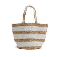 This roomy, versatile jute tote is handcrafted by artisans in India using traditional techniques. Perfect size to fit all your necessities for travel, a day at the beach or a walk into town. Jute woven tote Large open interior Handcrafted by artisans Perfect carryall tote Dimensions: 18"W x 12 1/2"H x 11"D Large Capacity Jute Beach Bag Basket Shape, Large Capacity Jute Tote Beach Bag, Jute Tote Beach Bag, White Jute Beach Bag For Everyday Use, Woven Burlap Tote Straw Bag, White Jute Bags, Large Capacity White Jute Beach Bag, Burlap Straw Tote Bag For The Beach, Natural Jute Tote Beach Bag