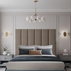 a bedroom with a bed, nightstands and two lamps on the wall above it