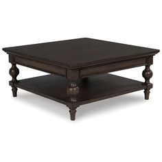 a wooden coffee table with two drawers on one side and an end table on the other