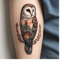 an owl with a house on it's back is shown in this tattoo design