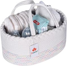 a white basket filled with lots of items