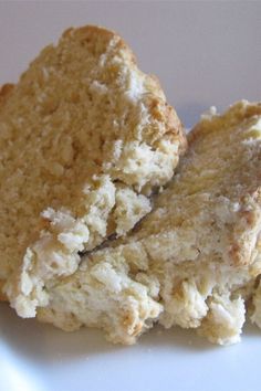 two pieces of cake sitting on top of a white plate