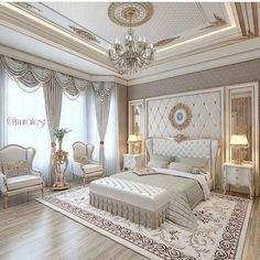 an elegant bedroom with chandelier and white furniture