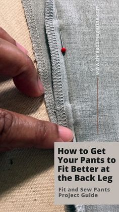 someone is stitching the back side of a piece of fabric with their thumbnails