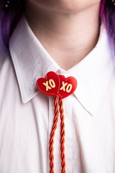 Accessorize in style with the XOXO Bolo Tie! Featuring a stylish red and gold heart design, this bolo tie is perfect for adding a touch of fun and personality to any outfit. Say "I love you" without saying a word with this playful and unique accessory. Summer Camp Wedding, Recruitment Outfits, Pink Cowgirl, Camp Wedding, Red Accessories, Diy For Teens, Tie Accessories, Say I Love You