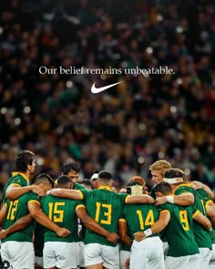 a group of men in green and white uniforms huddle together with the words, our belie remains unbreakable