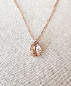 "Gorgeous, simple morganite pink Swarovski crystal necklace. Pendant crystal is 14x10mm. Rose gold finished metal. Also available in gold or silver plated. Chain is 18\" long." Blush Necklace, Pink Crystal Necklace, Morganite Necklace, Pretty Jewelry Necklaces, Pendant Necklace Simple, Necklace Swarovski, Swarovski Crystal Bracelet, Magical Jewelry, Swarovski Crystal Necklace