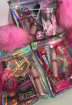 the contents of a barbie doll's makeup and accessories are displayed in plastic bags