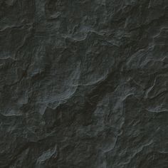 an image of a rock texture that looks like it has been painted black