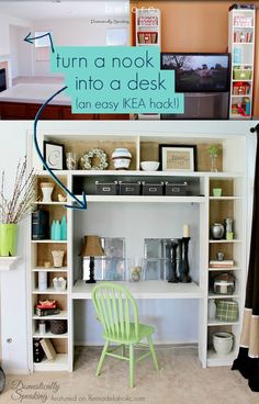 a white book shelf filled with lots of books next to a chair and other items