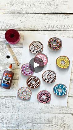 the doughnuts are decorated with icing and sprinkles to look like donuts