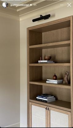 a book shelf with books and other items on it