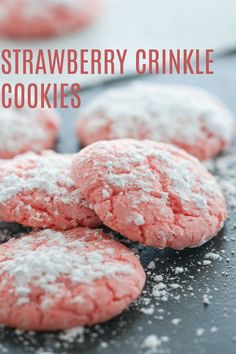 powdered sugar cookies on a baking sheet