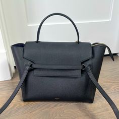 - Size: Mini (I.E. Largest Available Size Despite Its Name) Dimensions Below. - Color: Black Calfskin - Condition: Like New. Pristine Condition With No Signs Of Wear Or Scratches. Used Less Than 5 Times. - Other Notes: Bought In 2019 During Phoebe Philo Era So Has An Accent Above The First “E” In “Cline”. Mini : 11 X 9 X 6 In (27 X 23 X 16 Cm) Shoulder And Hand Carry Removable Leather Strap With 14 In (36 Cm) Drop Black Calf Leather Bag With Detachable Strap, Timeless Black Calf Leather Bags, High-end Black Calf Leather Bag, Black Calf Leather Office Bag, Luxury Everyday Black Shoulder Bag With Handle Drop, Timeless Black Bag For Everyday Luxury, Designer Black Calf Leather Bags, Black Designer Calf Leather Bag, Black Calf Leather Bag With Dust Bag Included