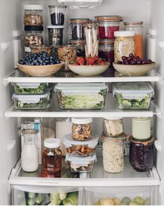 an open refrigerator filled with lots of food