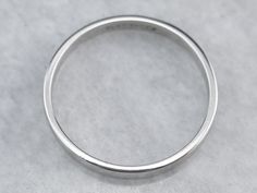 Simple and subtle, this platinum band features a low dome on top and a beautiful, soft polish. The profile and finish are completely un-decorated giving this piece a nice profile for a man or a woman. This band has a perfect polish and is ready to wear! Metal: Platinum Width of Band: 2.4 mm Height off Finger: 1.1 mm Ring Size: 6 Marks: "PLAT950FG" Stamped on the inside band Platinum Wedding Band, Stacking Bands, Platinum Wedding, Platinum Jewelry, Cameo Ring, July Birthstone, Blue Jewelry, Eternity Bands, A Man