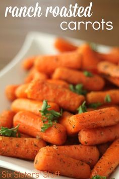 there is a white plate with carrots on it and the words ranch roasted carrots