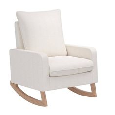 a white rocking chair with wooden legs and a seat cushion on the back, against a white background