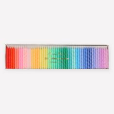 the rainbow colored pencils are in a metal box